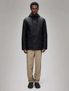 Nome Parka nero in tessuto tecnico leggero effetto gommato con cappuccio - Rains - FashionsVida