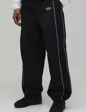 Men's Relaxed Fit Elasticated Front Binding Toggle Hem Nylon Track Pants Black Size X-Small Black XS - boohooMAN - FashionsVida