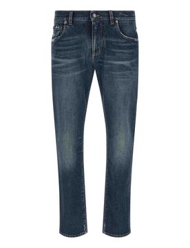 Jeans con toppa con logo