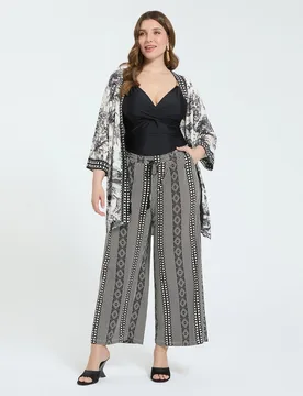 Pantalones de mujer palazzo de punto cintura elástica con cordón y borlas decorativas bolsillos laterales - Fiorella Rubino - FashionsVida