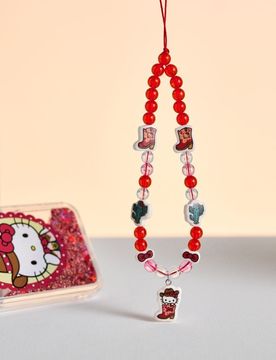 Ciondolo per telefono con motivo cowboy Hello Kitty - rosso