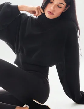 Sudadera de cuello alto con puños acanalados, dobladillo con burbujas curvas, cintura larga y holgada, de modal suave y cálido para uso diario - Shein - FashionsVida