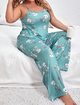 Conjunto de pijama con top de camiseta y pantalón con gráfico de dibujos animados, talla grande - Shein - FashionsVida