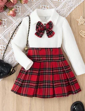 Set de 2 piezas: Blusa de manga larga con cuello polo y decoración de lazo + Falda a cuadros, estilo europeo y americano para niñas, para primavera/ - Shein - FashionsVida