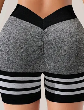 Pantalones cortos deportivos con forma de "V" en la espalda, sin costuras y de alta elasticidad - Shein - FashionsVida