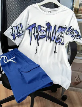 Set de 2 piezas: Camiseta gráfica casual y pantalones cortos cargo de ajuste holgado para adolescentes varones - Shein - FashionsVida