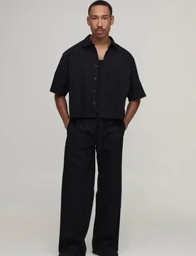 Herren Verkürzt Geschnittenes Kastenförmiges Übergroßes Hemd & Weite Hosen Set Black Größe XS - boohooMAN - FashionsVida
