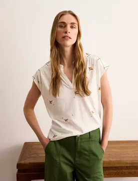 Camiseta de mujer con bordado mini flor - Lloyd's - FashionsVida