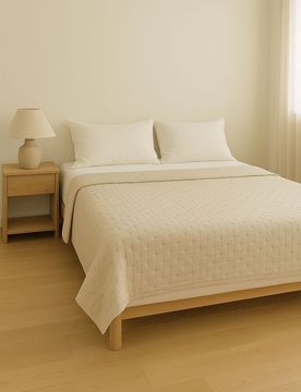 Copriletto con motivo in rilievo - beige