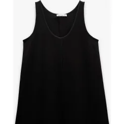 Vestido midi fluido en liso