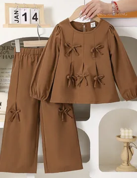 Conjunto de 2 piezas de top con decoración de lazo + pantalones de pierna ancha, elegante y dulce para niña, para primavera/otoño - Shein - FashionsVida