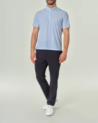 Polo micro fantasia bianca e azzurra in tessuto tecnico hyper comfort