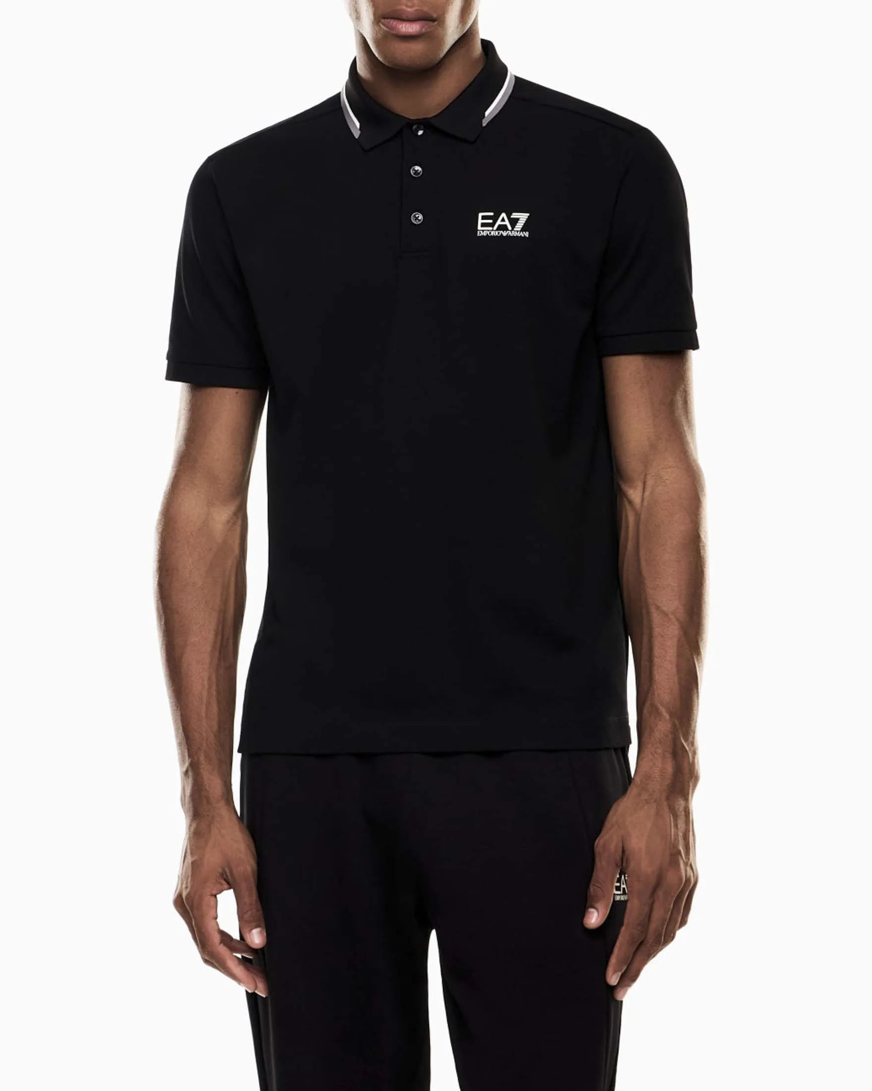 Polo nera in cotone stretch con logo stampato e bordini a contrasto - EA7 - FashionsVida