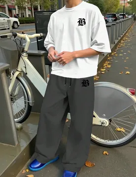 Set de 2 piezas que incluye camiseta de hombre con estampado de letra y pantalón de chándal con cintura elástica y ajuste holgado - Shein - FashionsVida