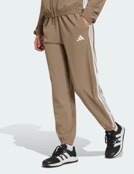 Pantaloni Train Essentials 3-Stripes Woven 2XL Khaki Six - Adidas - FashionsVida