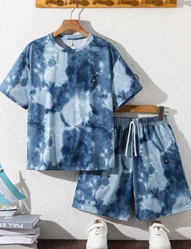 Conjunto de camiseta de manga corta y pantalones cortos con estampado tie-dye para niño preadolescente, vacaciones - Shein - FashionsVida