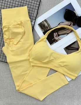 Conjunto de 2 piezas de yoga y fitness sin costuras para mujer, sujetador deportivo de cintura alta y leggings ajustados, diseño de cuello halter y e - Shein - FashionsVida