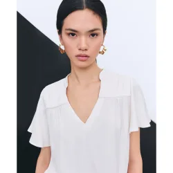 Blusa de mujer de manga corta y capa