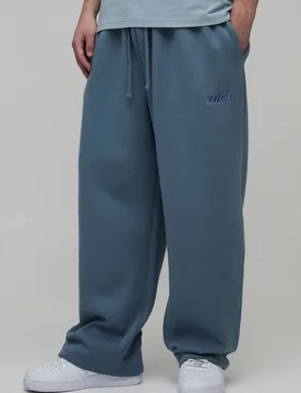 Herren Ballonschnitt Bestickte Gewaschene Jogginghose Slate Größe Large - boohooMAN - FashionsVida