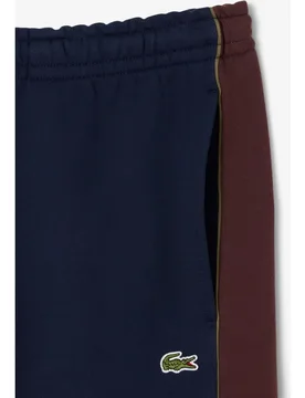 Pantalones cortos de hombre color block de felpa en blanco - Lacoste - FashionsVida