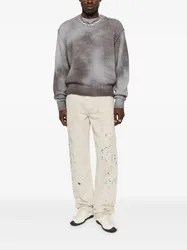 Jeans macchiati di vernice