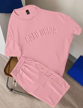Conjunto casual de camiseta de manga corta con cuello redondo y estampado de letras, y pantalones cortos con cordón en la cintura para hombre, conjun - Shein - FashionsVida
