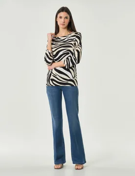 Jeans bootcut Sport lavaggio stone wash con linea svasata sul fondo - Marella - FashionsVida