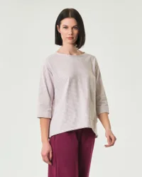 Top a righe avorio e beige con maniche al gomito e tasca applicata sul fronte