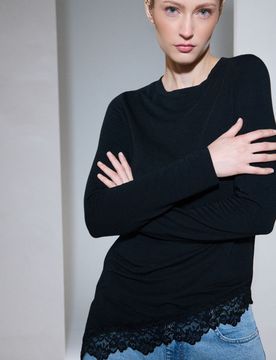 Blusa con orlo asimmetrico e pizzo - nero