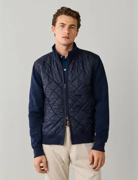 Chaqueta híbrida para hombre con frontal acolchado y mangas de punto - FACONNABLE - FashionsVida