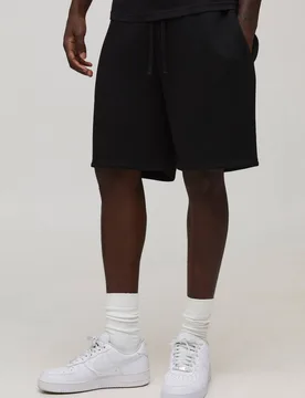 Herren Basic Relaxed Fit Shorts Black Größe XL - boohooMAN - FashionsVida