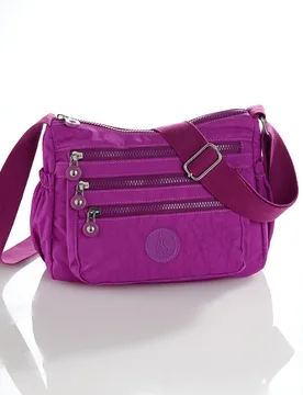 Nylon-Umhängetasche "Inga" mit RFID-Schutz fuchsia - Amelie di Santi - FashionsVida