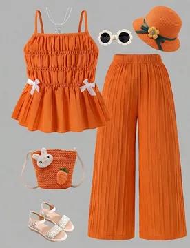 Conjunto de top de tirantes con estampado de rayas y lazo dulce y lindo y pantalones anchos drapeados para niñas en verano - Shein - FashionsVida