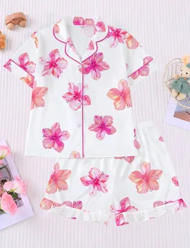 Set de 2 piezas de pijama para niños, estampado floral hawaiano, tela suave, camisa de manga corta con cuello y botones, pantalones cortos elásticos - Shein - FashionsVida