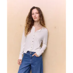 Chaqueta de mujer detalle botón puño cuello redondo