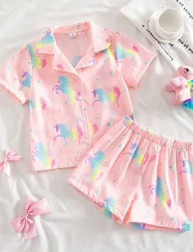 Conjunto de pantalones cortos y blusa de manga corta con estampado de lazos rosa para niña, ropa de estar en casa ignífuga - Shein - FashionsVida
