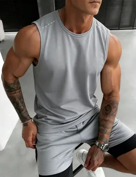 Conjunto de camiseta sin mangas y pantalones cortos deportivos de verano para hombres - Shein - FashionsVida