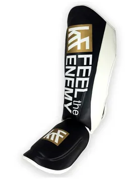 Tège-tibias Black / Gold M