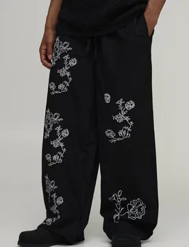 Herren Weite Hose Aus Leinenmischung Mit Kleiner Blumenstickerei Black Größe Small - boohooMAN - FashionsVida