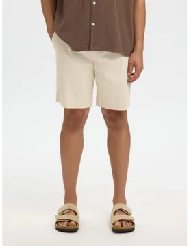 Pantalon corto de hombre, con bolsillos laterales regular fit - Selected - FashionsVida