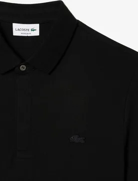 Polo de hombre de corte regular paris de piqué elástico de manga corta - Lacoste - FashionsVida