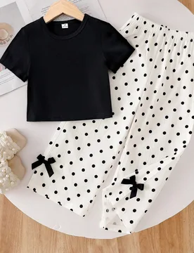 Piezas/Set Conjunto de camiseta de verano para niña, top de cuello redondo de manga corta negro minimalista de moda con pantalones largos de pierna a - Shein - FashionsVida