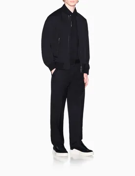 Polo a maniche corte Exchange nera in cotone con logo ricamato - Armani - FashionsVida