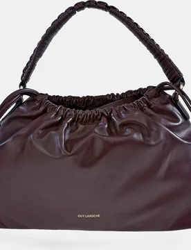 Bolso bucket en piel con cierre magnético y cordón - Guy Laroche - FashionsVida