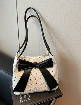 Bolso de hombro de mujer de gran capacidad, elegante y de moda, con decoración de lazo de piel de PU de unicolor y súper ligero - Shein - FashionsVida