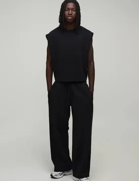 Herren Verkürztes Premium-Interlock-Oberteil Und Weite Jogginghose Im Set Black Größe Medium - boohooMAN - FashionsVida