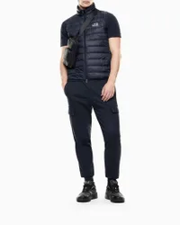 Gilet blu in nylon trapuntato con logo frontale stampato e imbottitura in piuma