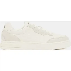 Zapatillas de hombre con multilogos en relieve