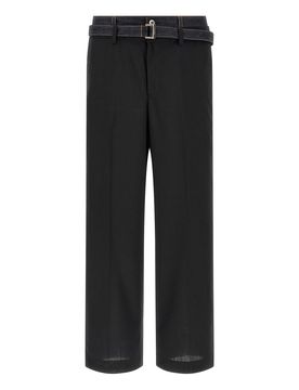Pantaloni con inserto in denim