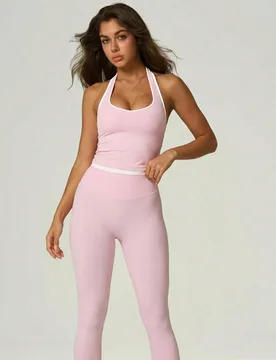 Conjunto deportivo sin costuras de 2 piezas para mujer, top de tirantes halter sin espalda en color contrastante, leggings de cintura alta con efecto - Shein - FashionsVida